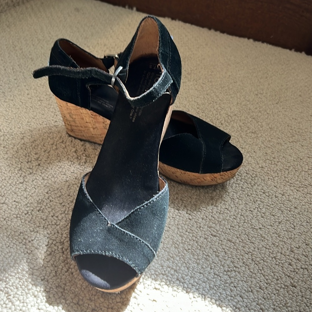 Pre-loved black TOMS wedges in good condition, with bag. W 7.5.